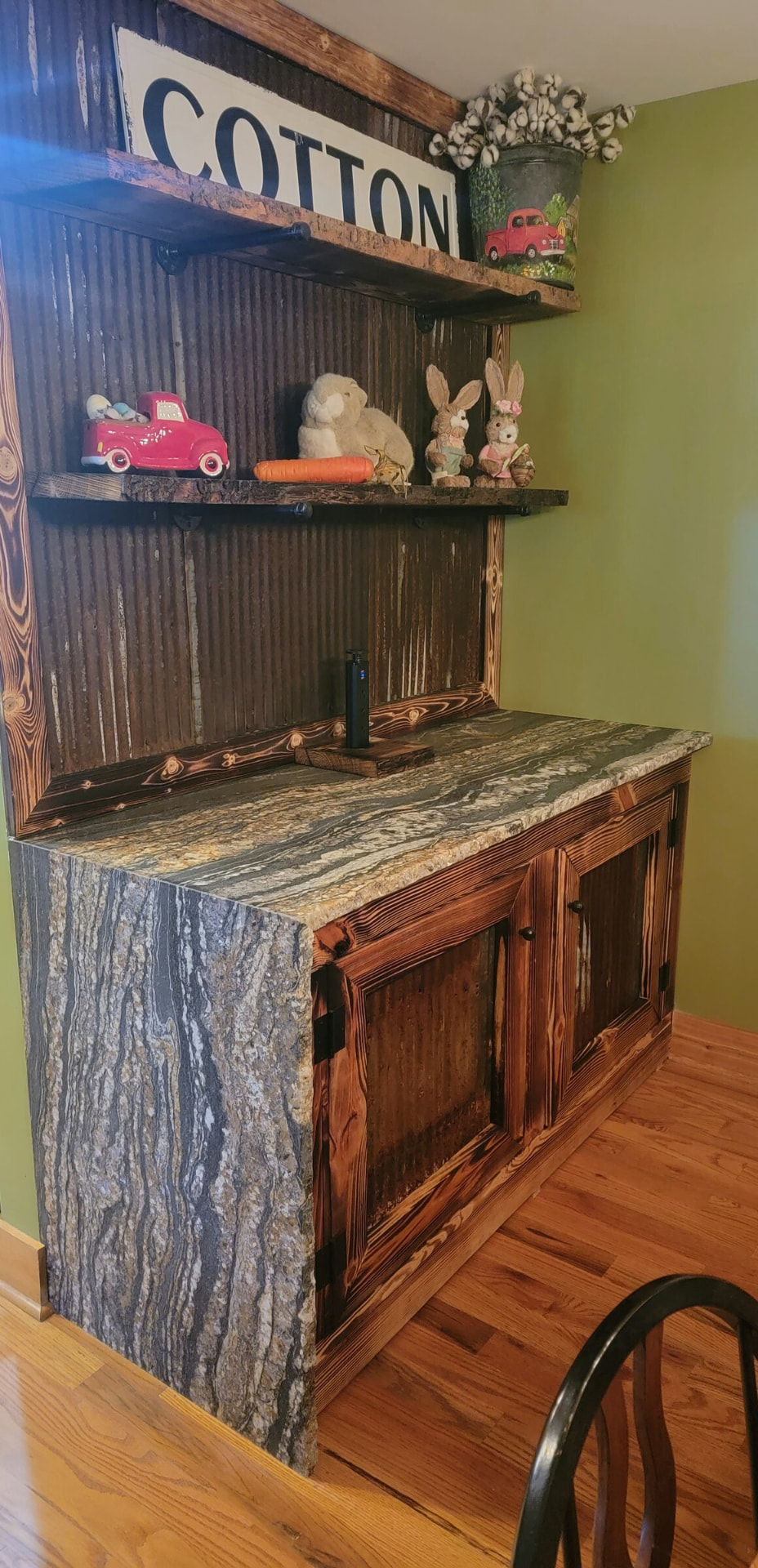 Rustic cabinet with a waterfall granite top