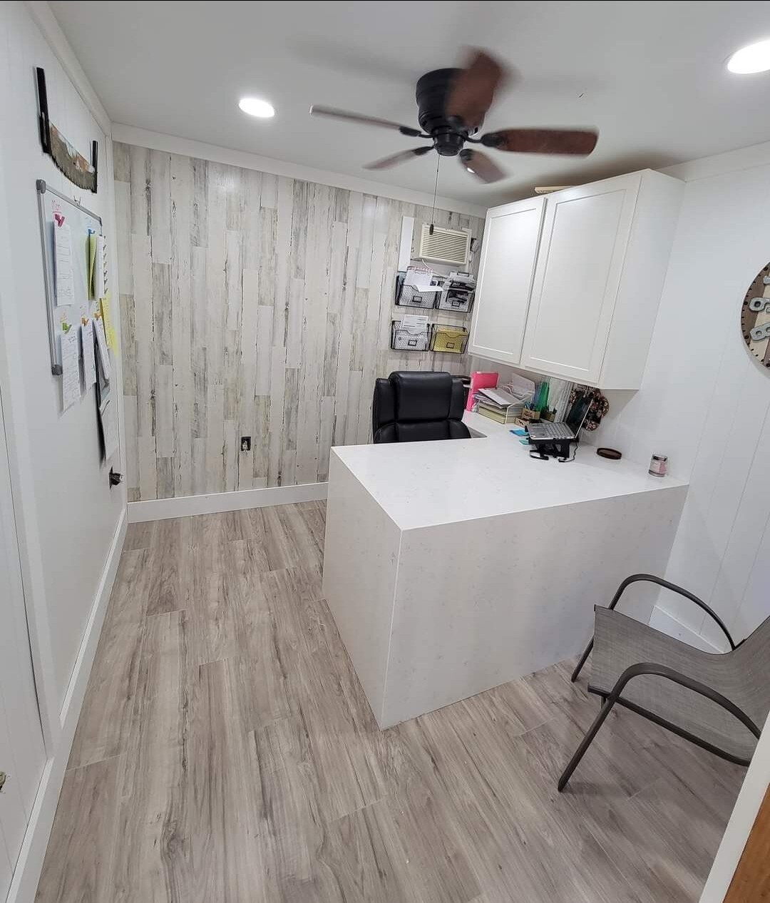White quartz waterfall desk in a home office